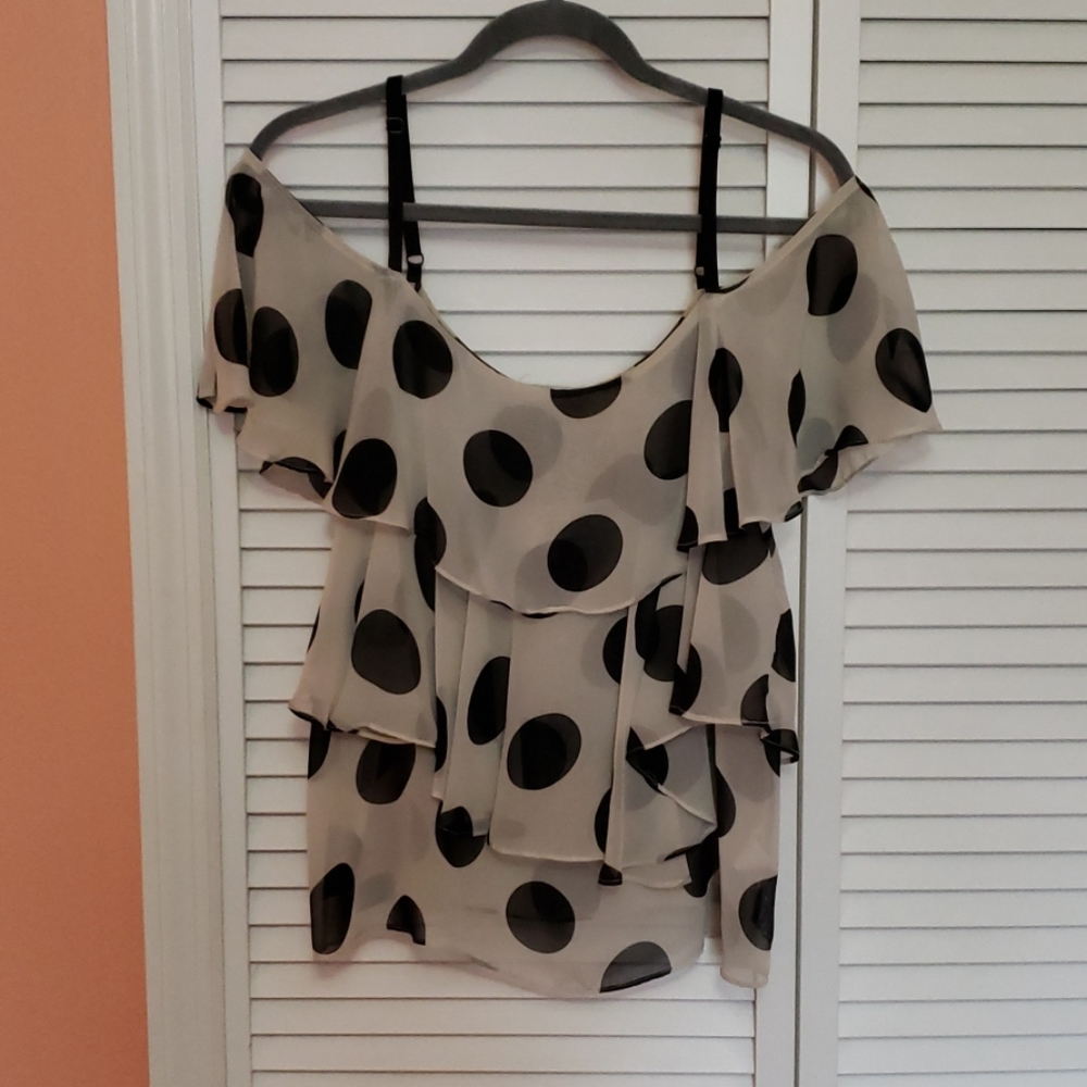 Cold shoulder polka dot blouse.
